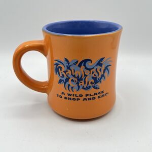 1999 Rainforest Cafe Mug Cup Souvenir Orange  "A WILD PLACE TO SHOP AND EAT"